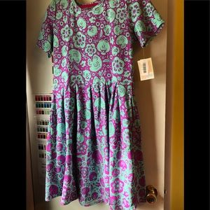 Lularoe Amelia w/ pockets beautiful vibrant tone changes place on pattern bottom